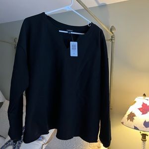 Torrid Sweatshirt. New with Tags (still in packaging).